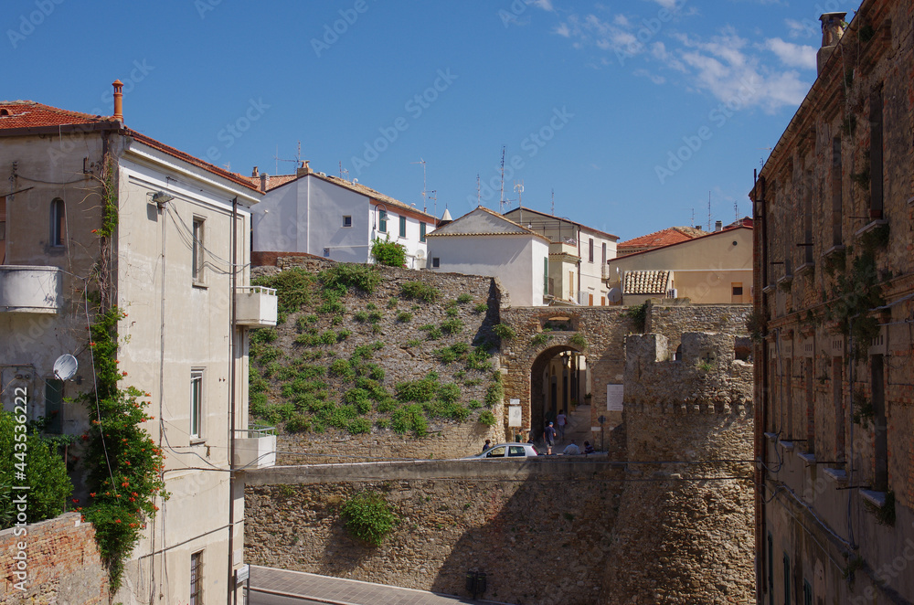 Entrance to the ancient village of Termoli with the belvedere tower in the foreground. Molise, Italy