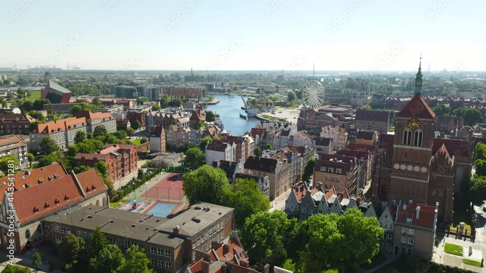 Aerial view of Old Town in Gdansk - Church of Sts. John, Primary School No. 50, Nova Motlawa river, Museum of WWII on background Aerial view of Old Town in Gdansk - Church of Sts. John, Primary School No. 50, Nova Motlawa river, Museum of WWII on background