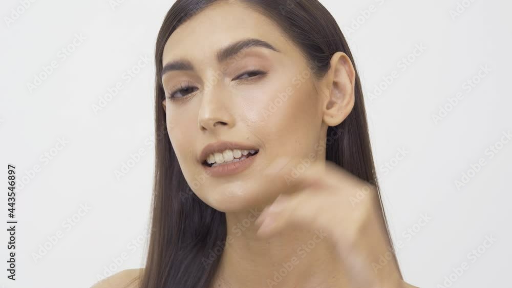 Beautiful Woman in White Background. She looking to camera with smiling. Beautiful Woman in White Background. She looking to camera with smiling.