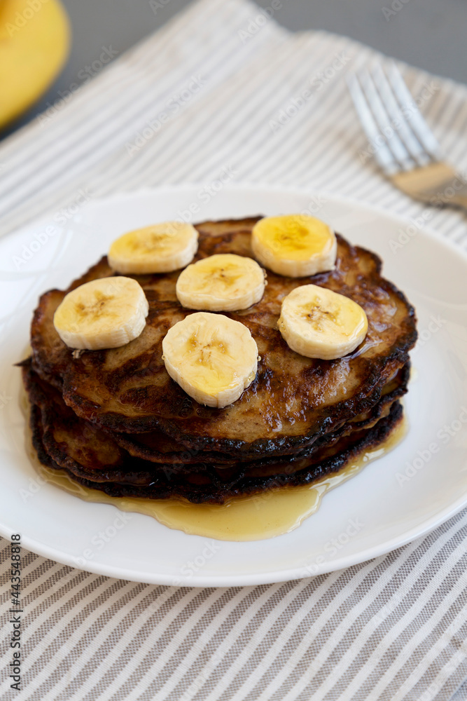 Homemade Banana Pancakes with Honey, low angle view. Homemade Banana Pancakes with Honey, low angle view.