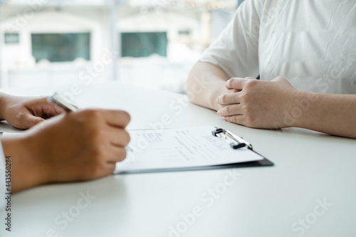 Female doctors explain and recommend treatment after a Male patient meets a doctor and receives results regarding illness problems. Medical and health care concepts