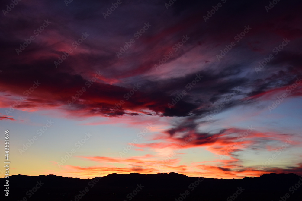 Multi-colored sunset over the front range of the rocky mountains of colorado. as seen from broomfield, colorado