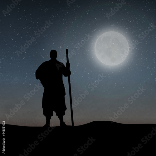 An Asian Soldier Holding The Stick Under The Moonlight