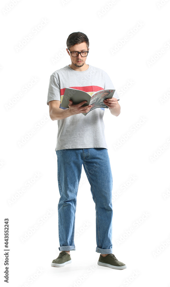 Handsome man reading magazine on white background Handsome man reading magazine on white background