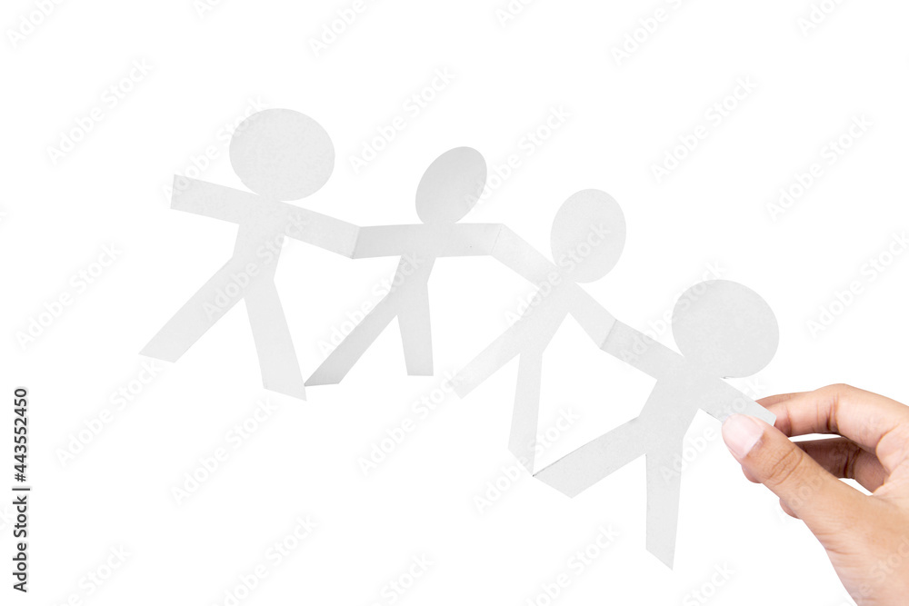 Hand holding white people paper holding hands with a white background Hand holding white people paper holding hands with a white background