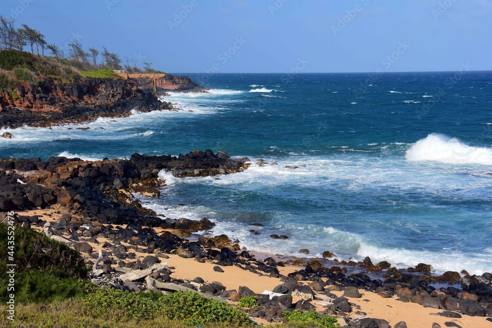 the pineapple dump pier, coastline, and surf along the kauai path, north of kapa'a, kauai, hawaii