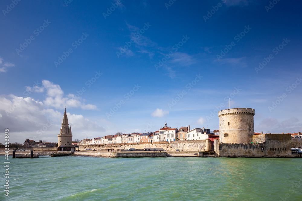 Entrance of the old harbor of La Rochelle in France, with the Tour de la Chaine on the right side and Tour de la Lantern on the left side, Nouvelle Aquitaine region, Charente-Maritime, France