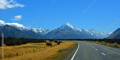 mount cook and spectacular glaciated mountain scenery on a sunny day in summer on the road to mount cook village on the south island of new zealand