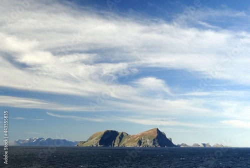 mountainous islands on a sunny day in summer on a  cruise in the lofoten archipelago near leknes, norway photo