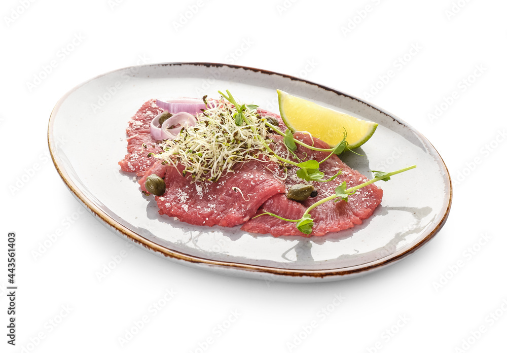Plate with tasty veal carpaccio on white background Plate with tasty veal carpaccio on white background