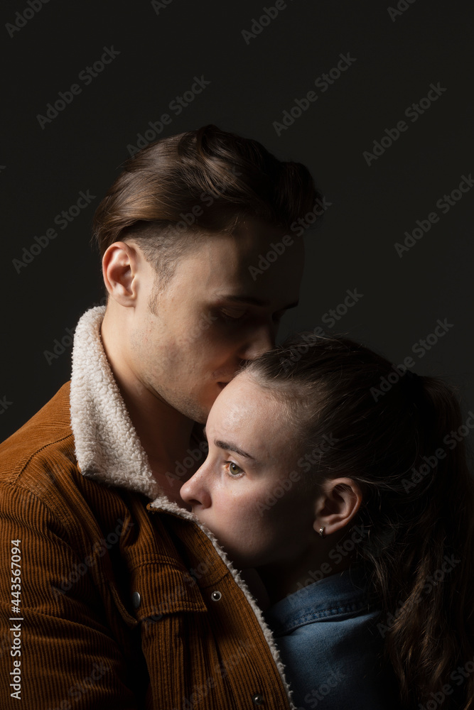 Studio portrait affectionate young couple
Studio portrait affectionate young couple