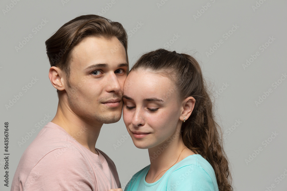Portrait serene, affectionate young couple
Portrait serene, affectionate young couple