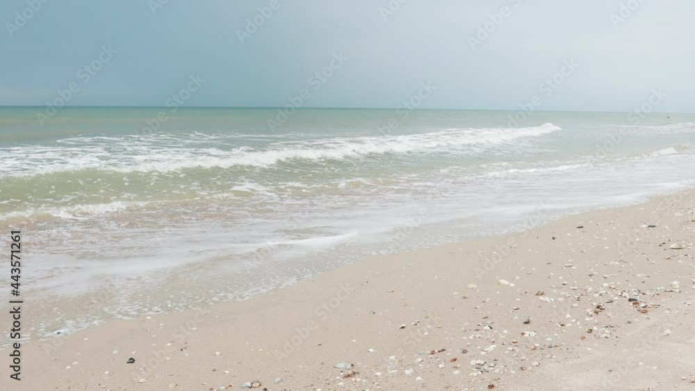 beautiful sunrise over the sea. foreground stone backgrounds