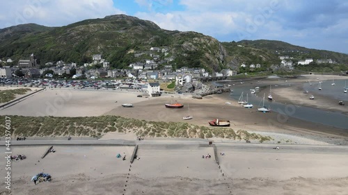 Barmouth beach with tide out North Wales, UK seaside town in summer  aerial footage photo