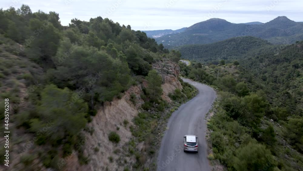 4K Drone clip tracking a car through a winding road on a tourist attraction in El Garbi, Valencia, Spain 4K Drone clip tracking a car through a winding road on a tourist attraction in El Garbi, Valencia, Spain
