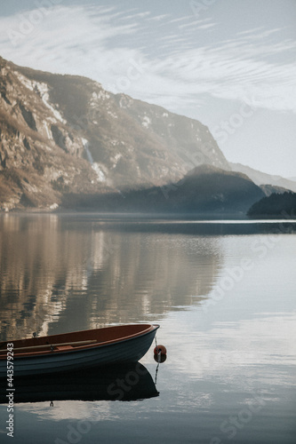 Tiny boat on still waters in Fjaerland  Norway