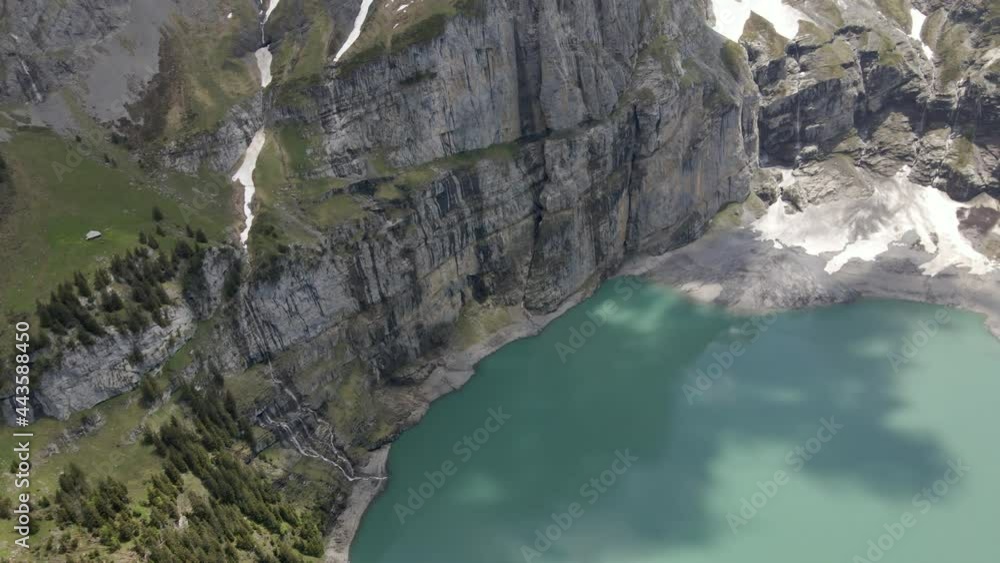 Bird eye view of the rocky cliffs surrounding the Oeschinensee in Switzerland Bird eye view of the rocky cliffs surrounding the Oeschinensee in Switzerland
