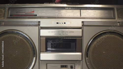 zoom out of a cassette tape boombox photo