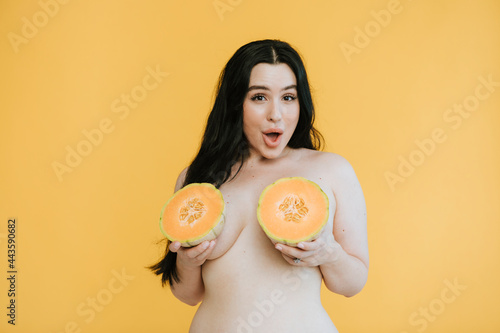 Beautiful woman with fruit boobs photo