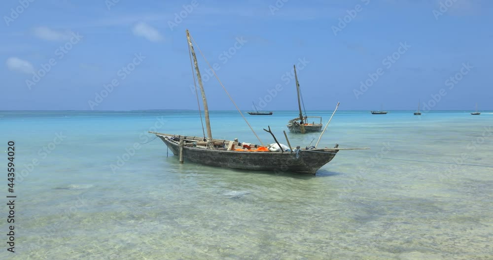 Authentic fishing boats on the coast of Zanzibar island, Tanzania, Africa Authentic fishing boats on the coast of Zanzibar island, Tanzania, Africa