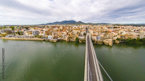 aerial views of the ebro river with boats and villages