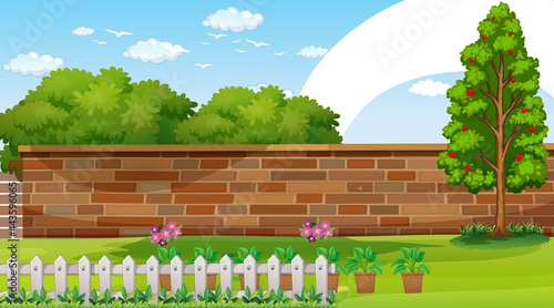 Park landscape scene with rainbow in the sky