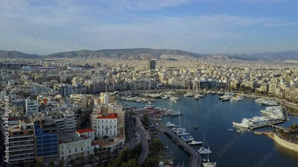 Aerial drone shot from Piraeus looking back at rest of Athens Greece, 4K. Aerial drone shot from Piraeus looking back at rest of Athens Greece, 4K.