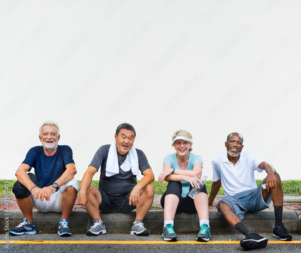 Fototapeta premium Group of senior friends relaxing together after an exercise