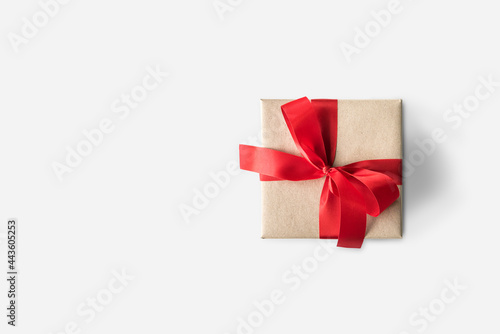 Wrapped present with a red ribbon