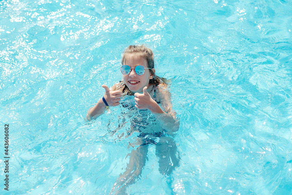 child in swimming pool