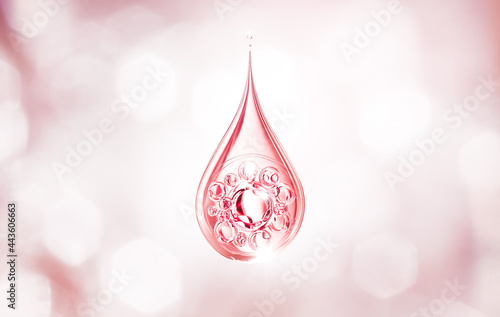 Pink collagen serum or essence drop, cosmetic advertising background, 3d rendering. photo