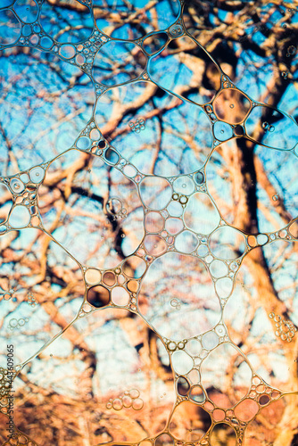 Abstract colourful background oil drops on water surface. Double exposure and mixed layers.