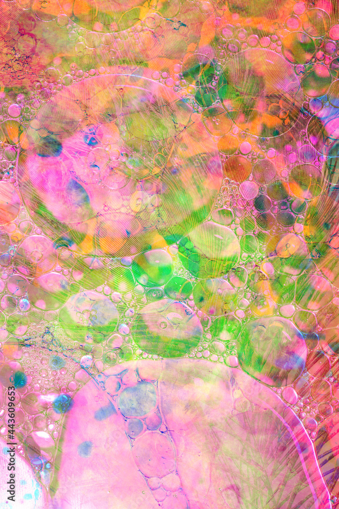 Abstract colourful background oil drops on water surface. Double exposure and mixed layers.