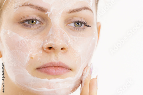 Girl apply cream cosmetic