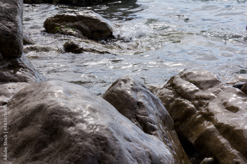 clear water stone rock sea. Stones and water background clear water stone rock sea. Stones and water background