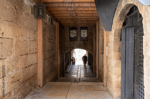 The tunnel lined with stones passes under buildings in the old city of Acre in northern Israel © svarshik