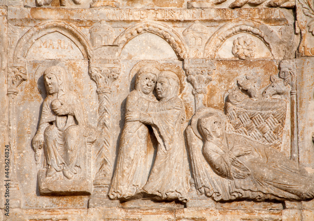 VERONA - JANUARY 27: Relief of Nativity from facade of romanesque Basilica San Zeno. Reliefs is work of the sculptor Nicholaus and his workshop on January 27, 2013 in Verona, Italy.