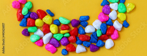 Wallpaper Mural colored pebbles on yellow background Torontodigital.ca