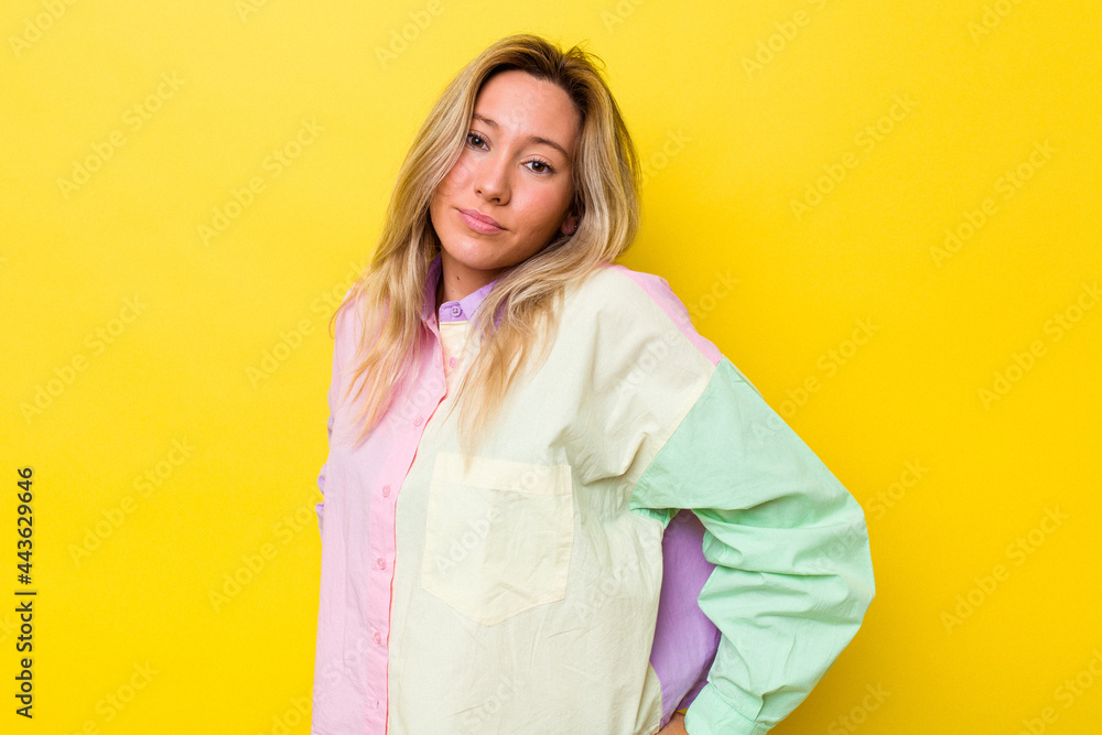 Young australian woman isolated frowning face in displeasure, keeps arms folded. Young australian woman isolated frowning face in displeasure, keeps arms folded.