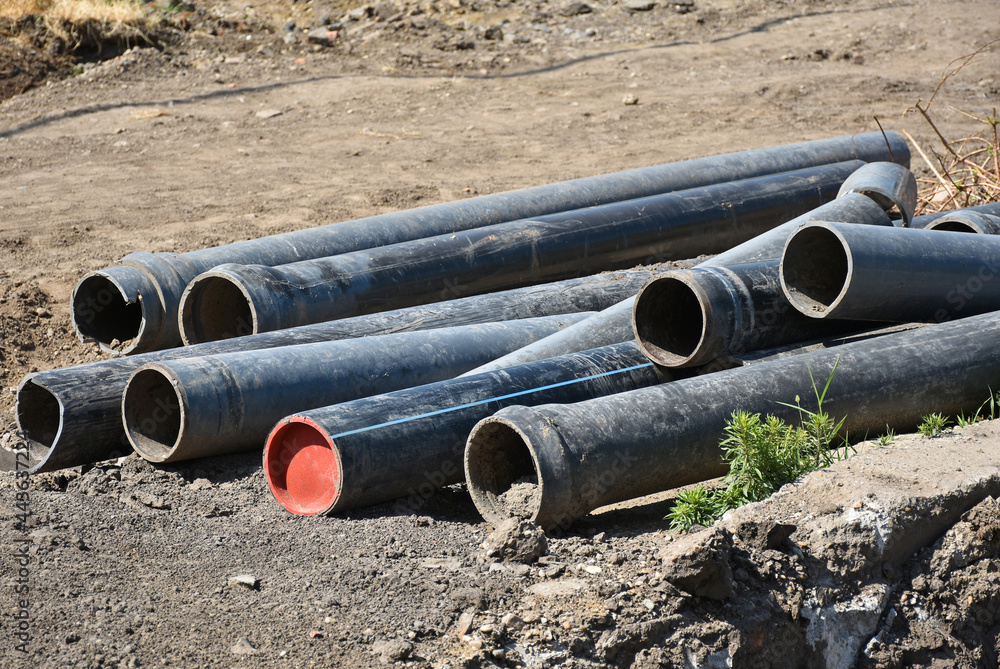 Large plastic pipes at the road construction