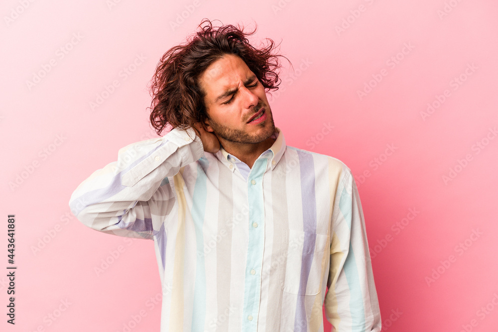 Young caucasian man isolated on pink bakcground tired and very sleepy keeping hand on head. Young caucasian man isolated on pink bakcground tired and very sleepy keeping hand on head.
