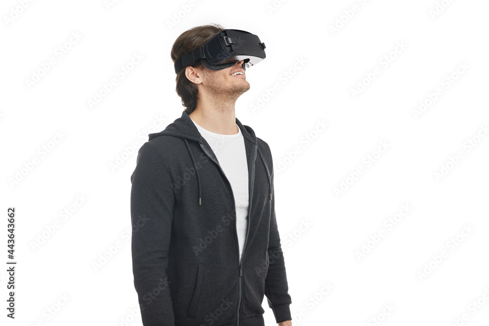 Smiling man enjoying virtual reality