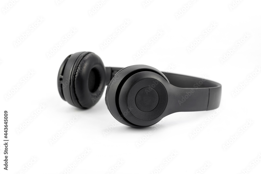 Modern design of black color wireless earphones isolated on white background. Modern design of black color wireless earphones isolated on white background.