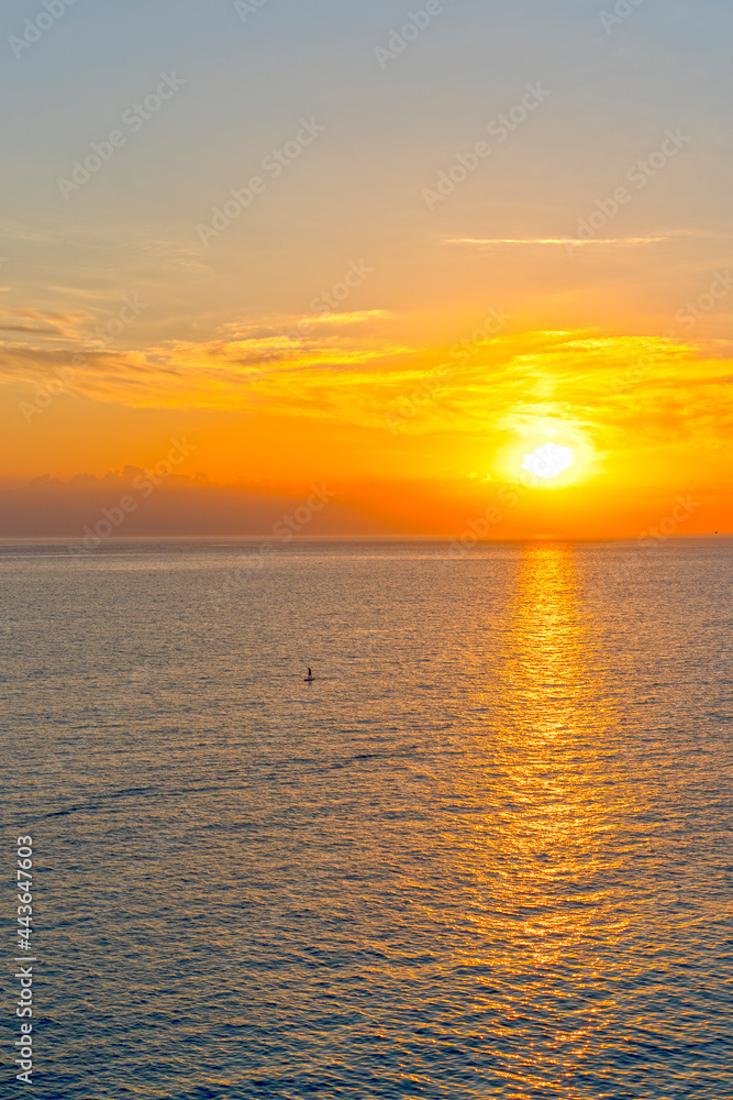 Colorful bright sunset on the background of the seascape