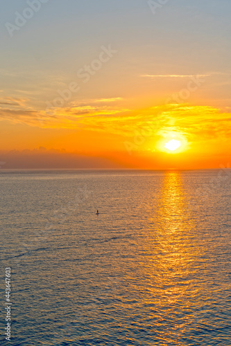 Colorful bright sunset on the background of the seascape