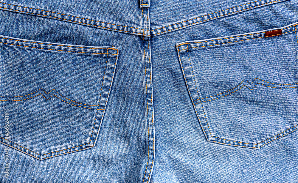 Fototapeta premium Denim fabric as abstract background close-up.