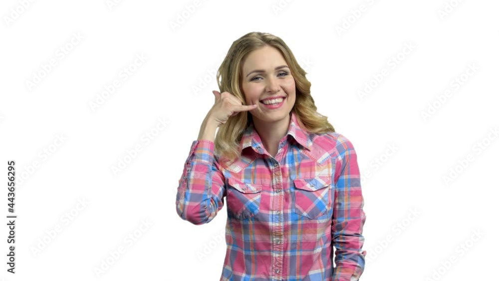 Beautiful smiling woman showing call me gesture. Beautiful smiling woman showing call me gesture.
