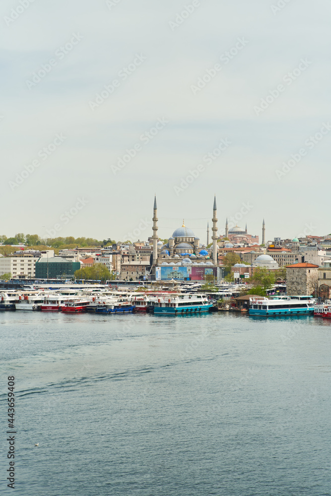 Istanbul, Turkey - May 2, 2021: View across the Bosphorus to the Suleymaniye Mosque.