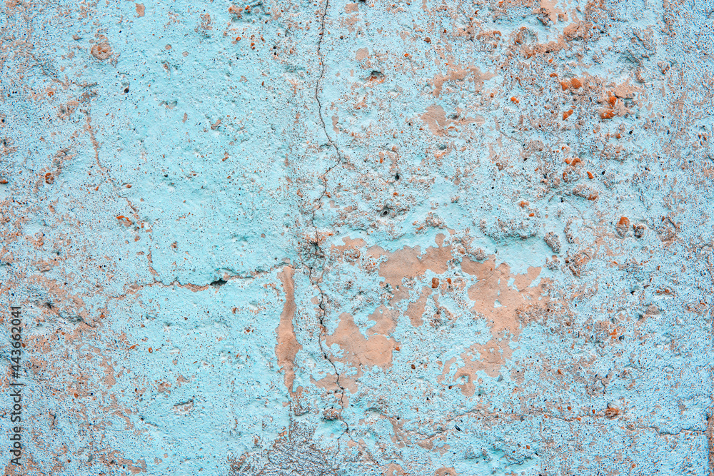 Old concrete wall. Grunge background or texture. Old blue whitewashed lime plaster wall. Old concrete wall. Grunge background or texture. Old blue whitewashed lime plaster wall.