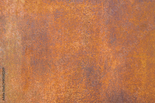 Background of a rusty metal wall. Rusted iron texture.